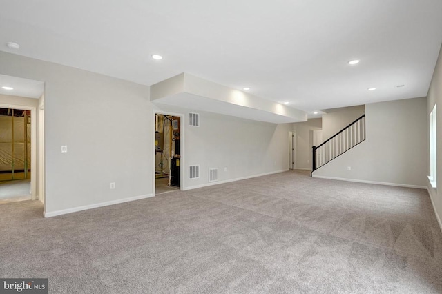 interior space with stairs, visible vents, and recessed lighting