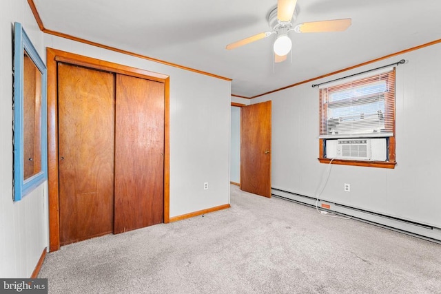 unfurnished bedroom featuring crown molding, baseboard heating, a closet, cooling unit, and light colored carpet