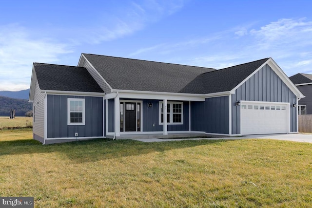 ranch-style house with a garage and a front yard