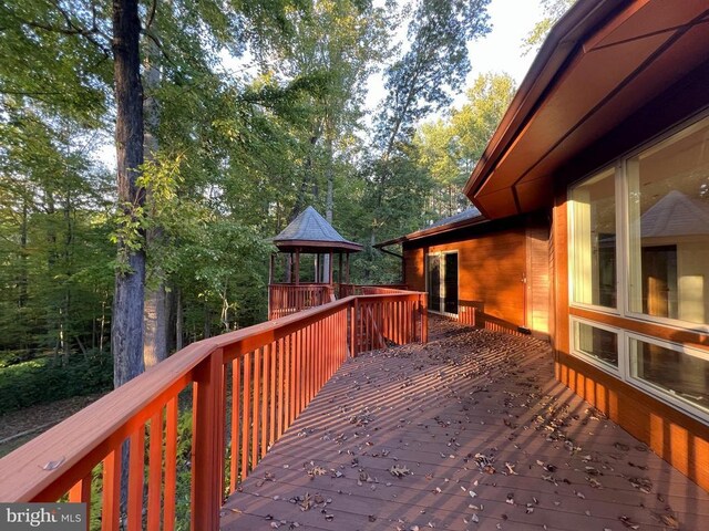 wooden deck with a gazebo