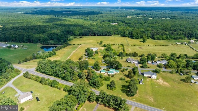 bird's eye view with a rural view and a forest view