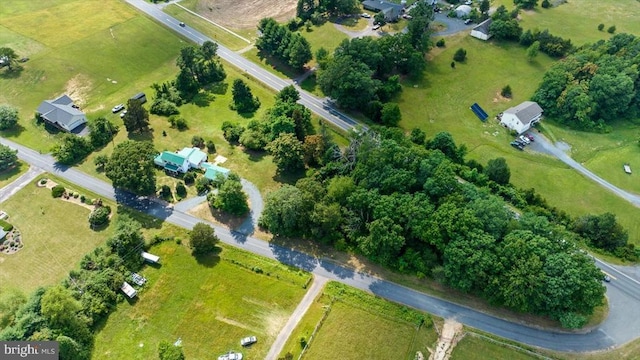 birds eye view of property featuring a rural view