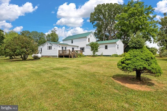 view of yard with a deck