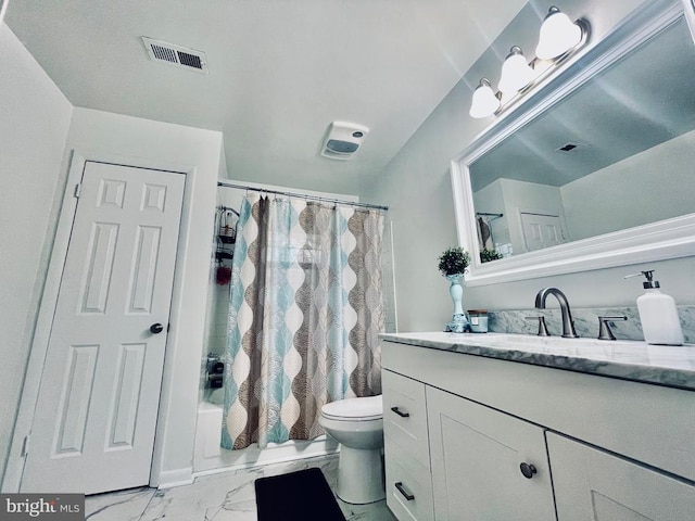 bathroom featuring vanity, toilet, shower / bath combo with shower curtain, marble finish floor, and visible vents