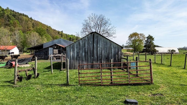 view of outdoor structure featuring fence