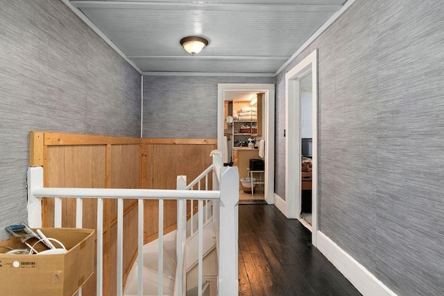 corridor with dark wood-style flooring