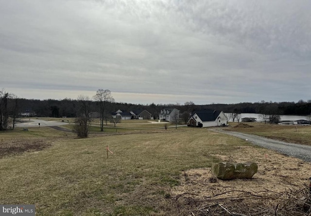 view of yard with a water view