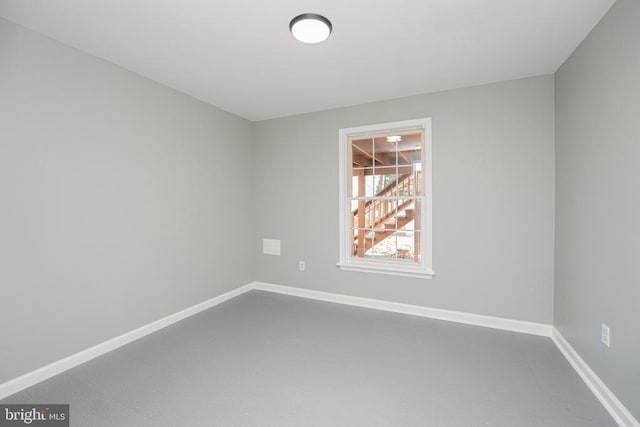 empty room with baseboards