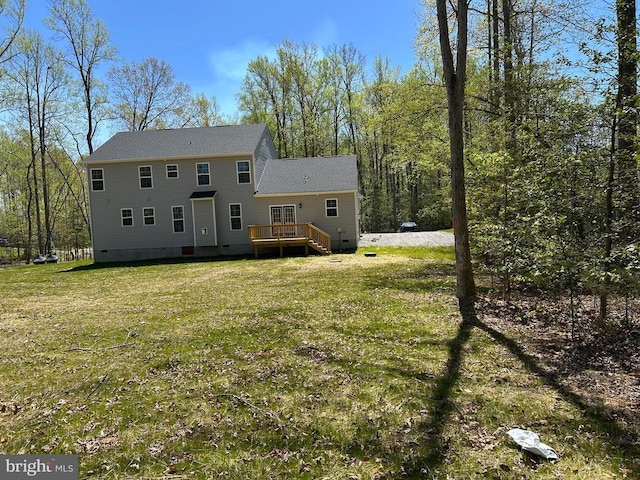 back of house featuring a wooden deck, crawl space, and a yard