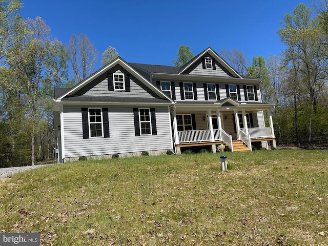 view of front of house with a porch, crawl space, and a front lawn
