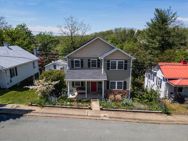traditional-style house with covered porch
