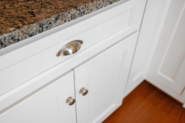 interior details featuring dark wood finished floors