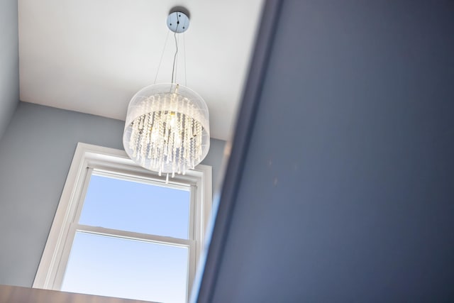 interior details with a chandelier