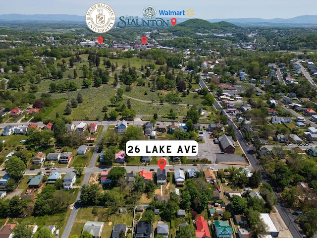 drone / aerial view featuring a mountain view