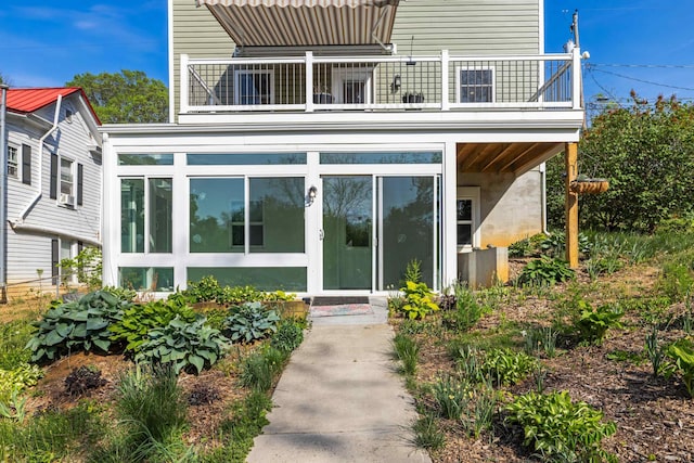 doorway to property featuring a balcony