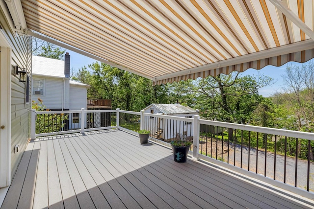 deck featuring an outdoor structure