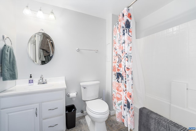 bathroom featuring tile patterned floors, toilet, shower / bath combo, baseboards, and vanity