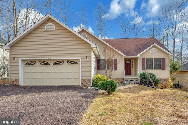 ranch-style house with driveway, a shingled roof, an attached garage, and stone siding