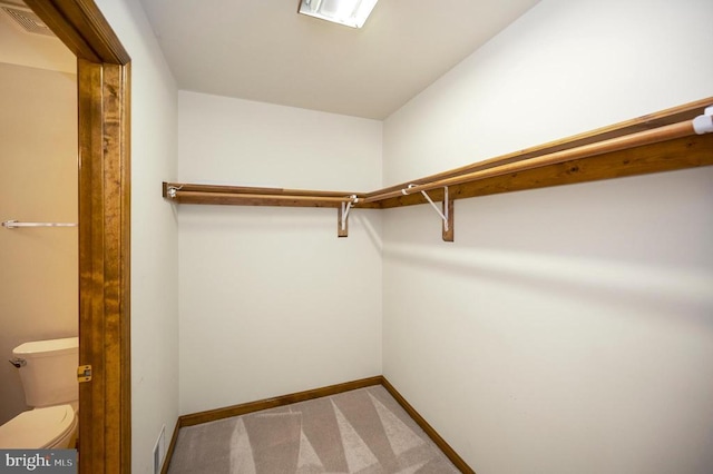 walk in closet with carpet flooring and visible vents