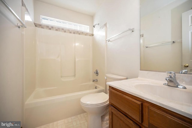 bathroom with toilet, tub / shower combination, and vanity