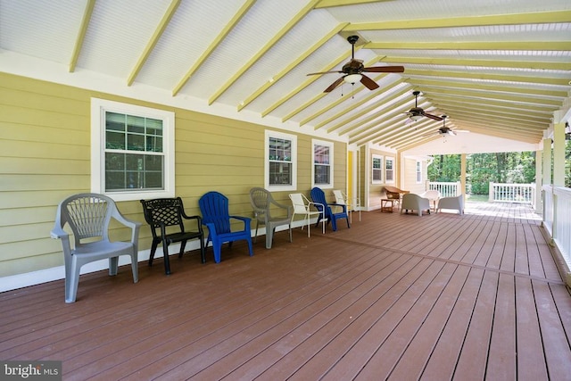 wooden terrace with a ceiling fan