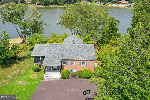 drone / aerial view featuring a water view