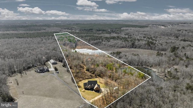 birds eye view of property with a rural view