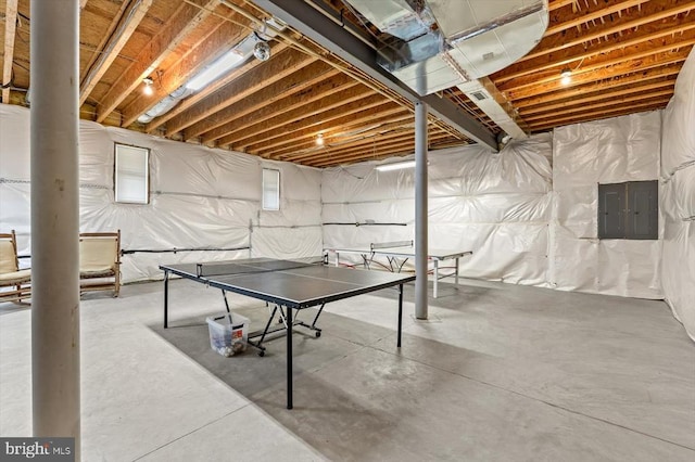 game room featuring concrete flooring