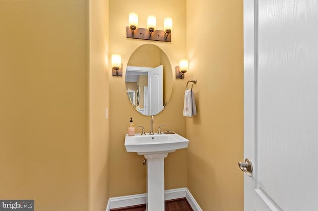 bathroom featuring baseboards