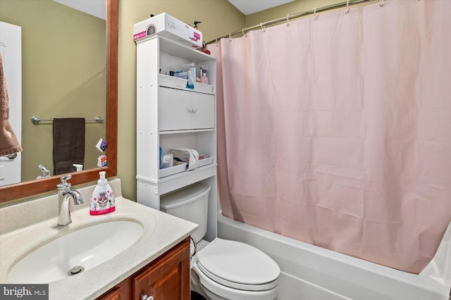 full bathroom featuring toilet, shower / bath combination with curtain, and vanity