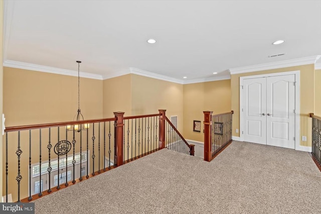 corridor featuring recessed lighting, carpet floors, an upstairs landing, baseboards, and crown molding