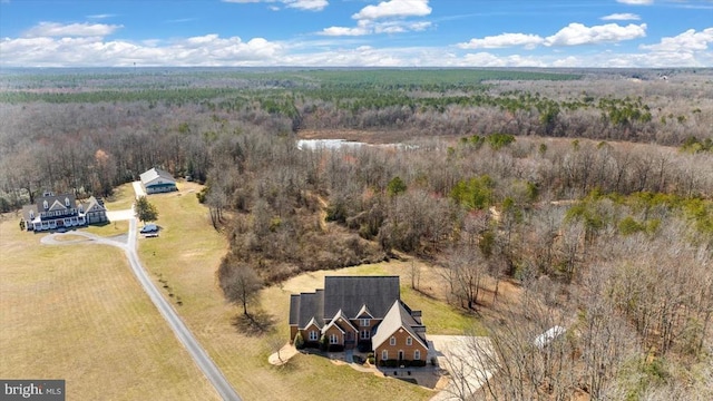 drone / aerial view with a forest view