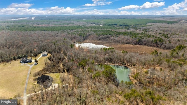 aerial view with a water view and a rural view