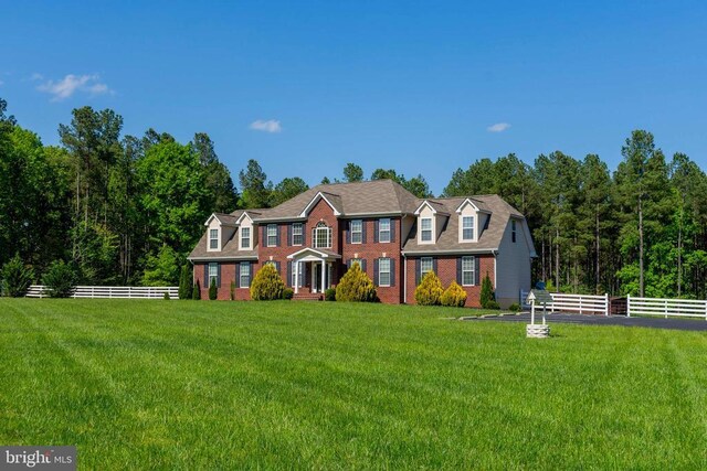 view of front of home with a front yard