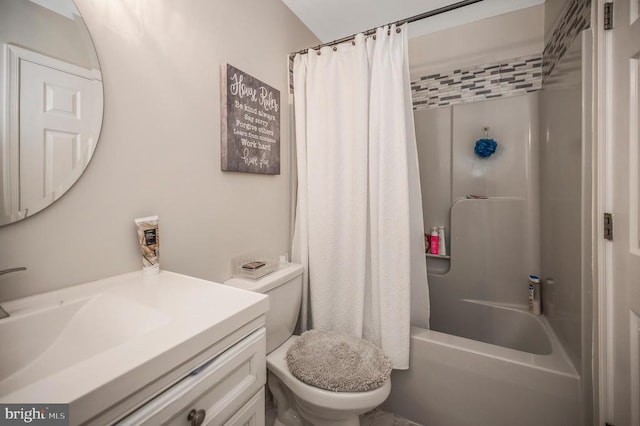 bathroom featuring shower / bathtub combination with curtain, toilet, and vanity