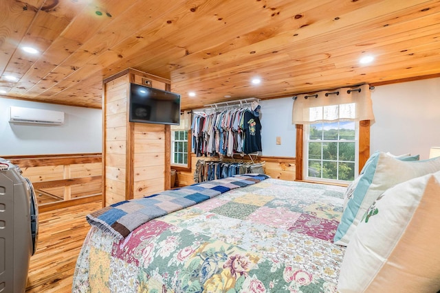 bedroom featuring a wainscoted wall, a wall mounted AC, wooden ceiling, and wooden walls