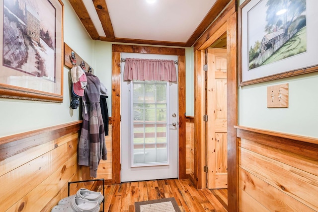 doorway with wood finished floors