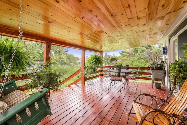 sunroom with wooden ceiling