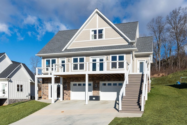 view of front of property with a front lawn and a garage