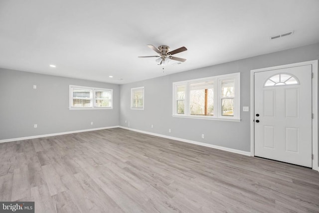 foyer featuring baseboards, visible vents, ceiling fan, wood finished floors, and recessed lighting