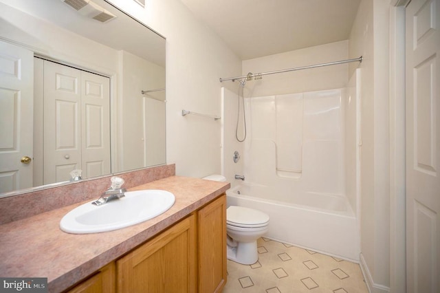 full bathroom with shower / tub combination, vanity, and toilet