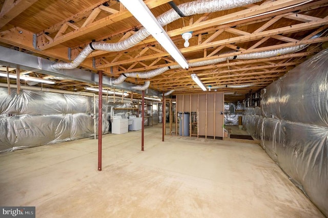 basement featuring washing machine and clothes dryer