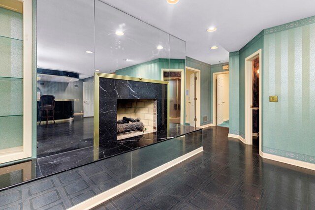 kitchen featuring a high end fireplace