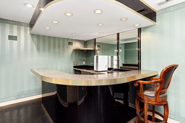 kitchen with wood-type flooring