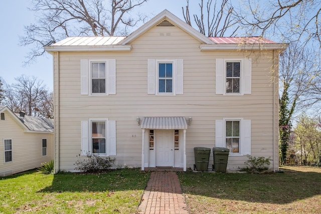 view of front of house with a front lawn