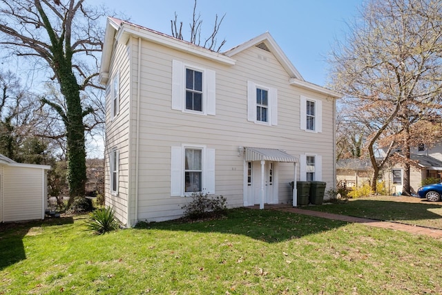 view of front of house featuring a front yard