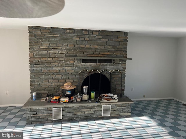 interior details with a brick fireplace