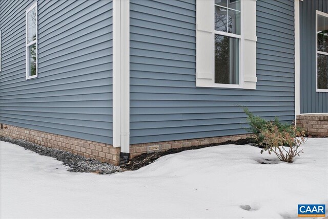 view of snow covered property