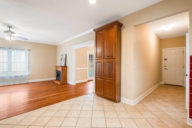 interior space featuring ceiling fan