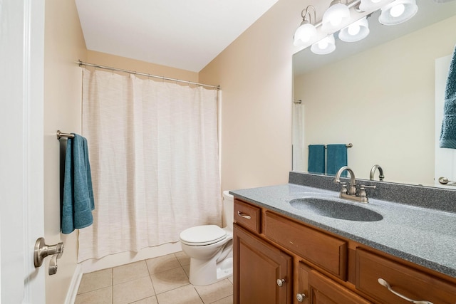 full bathroom featuring tile patterned flooring, vanity, toilet, and shower / tub combo with curtain